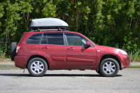 Серый бокс-багажник на крышу Аэродинамический "Turino Compact" от магазина ФаркопРос